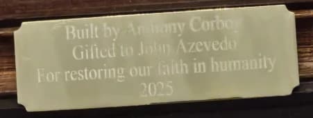 Engraved plaque on the ship model
